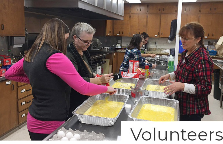 volunteers preparing food